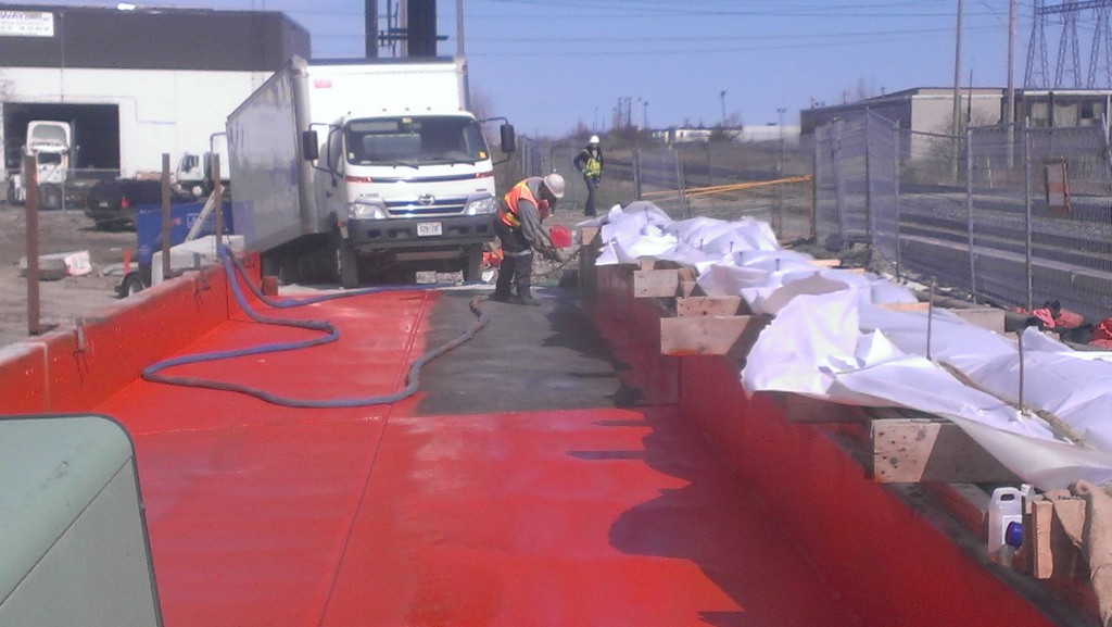 Spray applied waterproofing membrane on concrete bridge