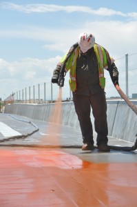 A worker installs BDM™ on the Eagle P3 56th Ave. Bridge